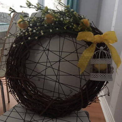 Spring Wreath with Birdcage and Yellow Ribbon